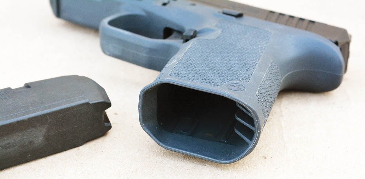 The magazine well features a large bevel to assist with fast magazine insertion.